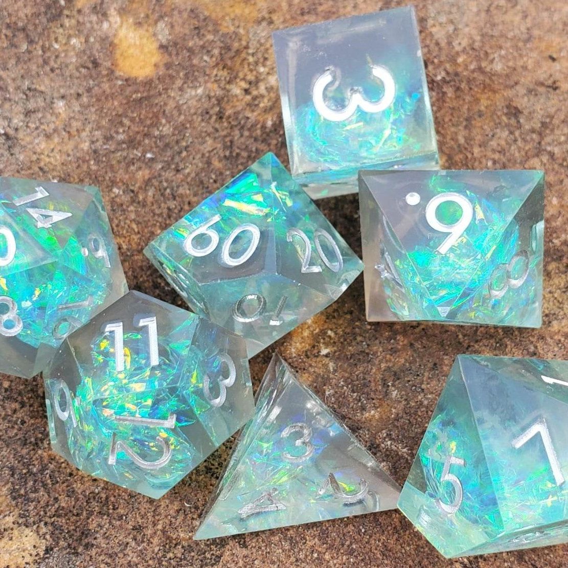 Sharp Edge Glimmer Green Resin Dice Set with Silver Numbering