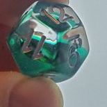 Clear and Green Dragon Eye Inclusion Resin Dice Set with Silver Numbering