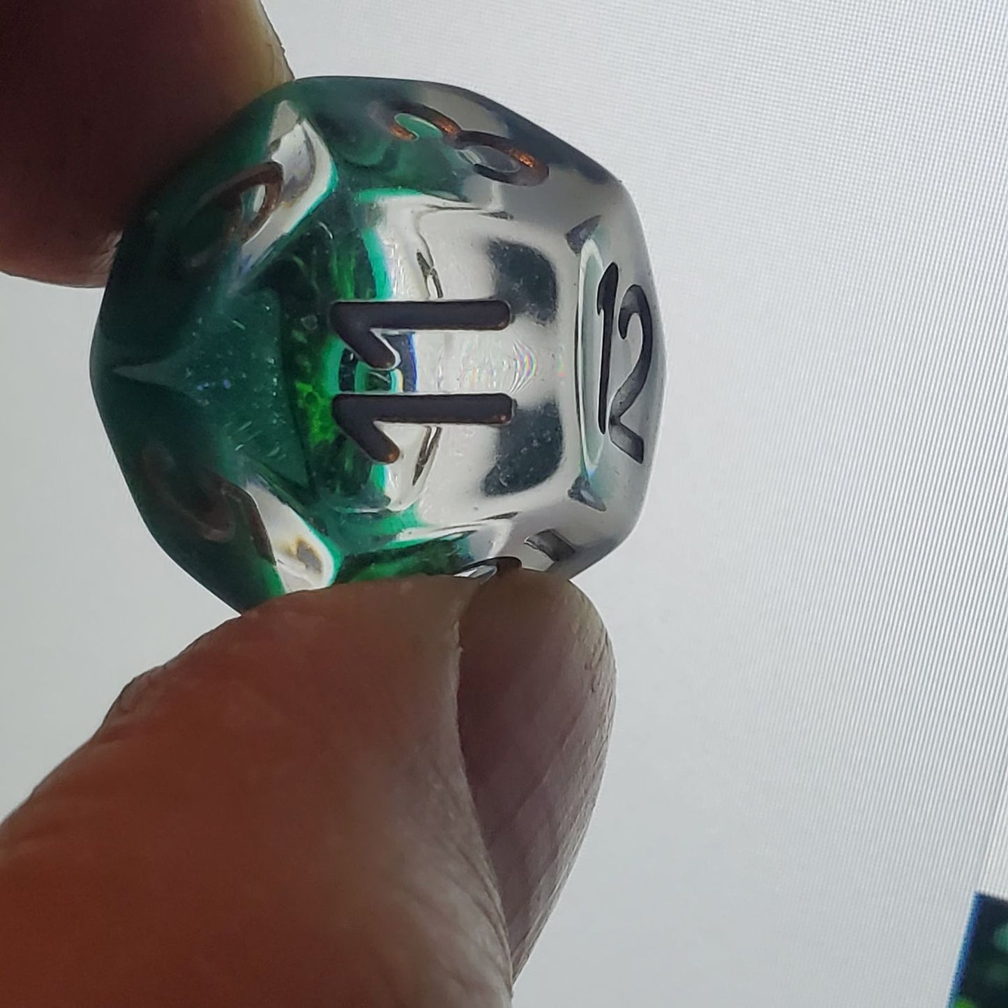 Clear and Green Dragon Eye Inclusion Resin Dice Set with Silver Numbering